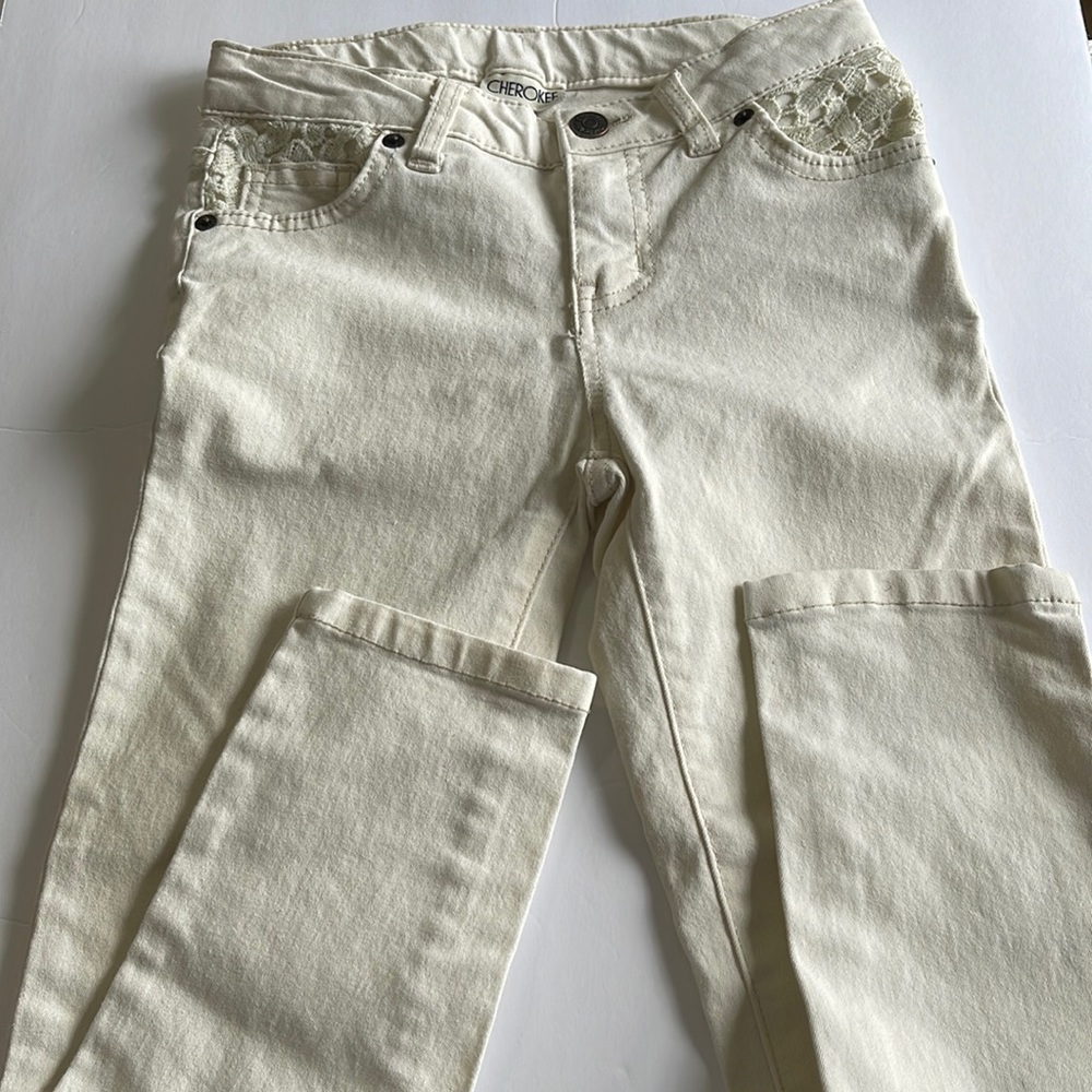 Cherokee girls size 8 cream color jeans with lace pockets